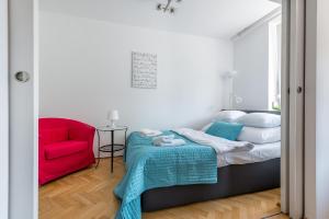 Posteľ alebo postele v izbe v ubytovaní P&O Apartments Plac Krasińskich