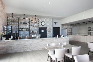 Lounge nebo bar v ubytování Arnarstapi Cottages + 28 fotografií