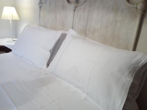 Postel nebo postele na pokoji v ubytování Monte Atena B&B di Charme