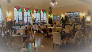 Reštaurácia alebo iné gastronomické zariadenie v ubytovaní Trattoria Traversi