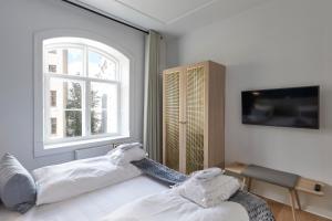 Postel nebo postele na pokoji v ubytování Copenhagen Strand