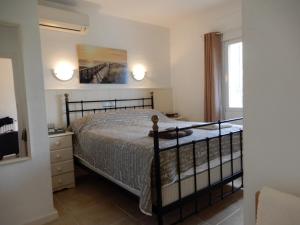 Postel nebo postele na pokoji v ubytování Villa Amare