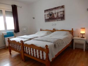 Postel nebo postele na pokoji v ubytování Villa Amare