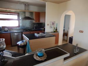 Kuchyň nebo kuchyňský kout v ubytování Villa Amare