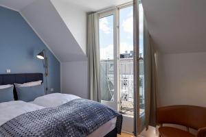 Postel nebo postele na pokoji v ubytování Copenhagen Strand