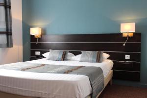 Cama ou camas em um quarto em Hôtel Chantepie