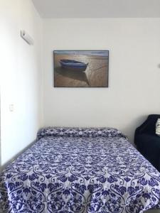 Postel nebo postele na pokoji v ubytování Estudios y Apartamentos Benal Beach + 35 fotografií