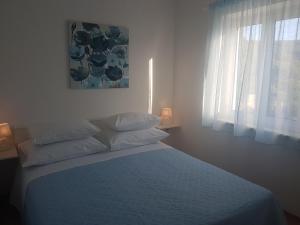 Posteľ alebo postele v izbe v ubytovaní Apartment Tempera