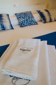 A bed or beds in a room at Villa Elizabeth