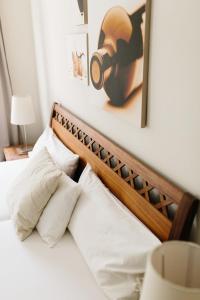 Säng eller sängar i ett rum på Wein- & Tafelhaus