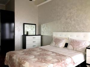 Letto o letti in una camera di Sunrise Hotel