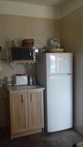 BellaVistaZmukic Guesthouse的厨房或小厨房