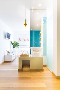 a bathroom with a desk and a sink at Casa Gli Archi in Balestrate