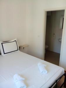 Postel nebo postele na pokoji v ubytování Maja rooms