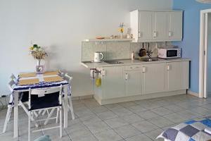 Virtuvė arba virtuvėlė apgyvendinimo įstaigoje Apartmán Tilia