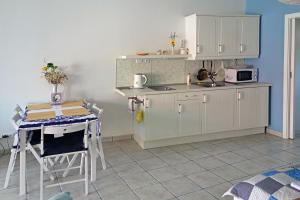 Kuchyň nebo kuchyňský kout v ubytování Apartmán Tilia + 22 fotografií
