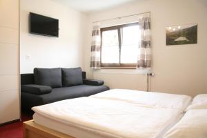 Ένα ή περισσότερα κρεβάτια σε δωμάτιο στο Apartment Köll