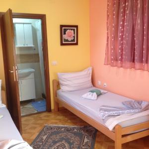 Postel nebo postele na pokoji v ubytování Guest House Rose