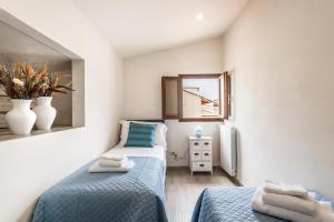 A bed or beds in a room at Dreamy Guelfa by Mmega