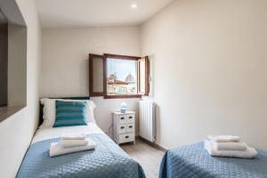 A bed or beds in a room at Dreamy Guelfa by Mmega