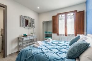 A bed or beds in a room at Dreamy Guelfa by Mmega