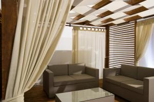 Area soggiorno di Seven Suite B&B