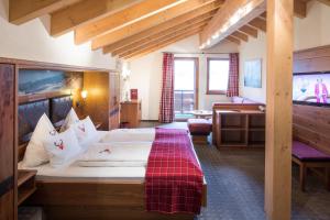 Postel nebo postele na pokoji v ubytování Hotel Leitner + 37 fotografií