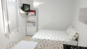 Ein Bett oder Betten in einem Zimmer der Unterkunft Classe Pousada