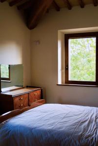 Säng eller sängar i ett rum på Villa Licinia
