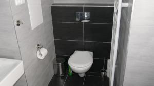 Kúpeľňa v ubytovaní Všemina Apartman