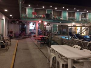 Restorāns vai citas vietas, kur ieturēt maltīti, naktsmītnē Crystal Sands Motel