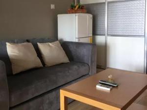A seating area at He&Her Youth Hostel