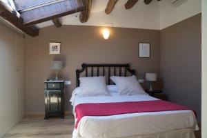 Ένα ή περισσότερα κρεβάτια σε δωμάτιο στο Vilosell Wine Hotel