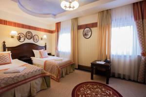 Posteľ alebo postele v izbe v ubytovaní Hotel St. Bruno