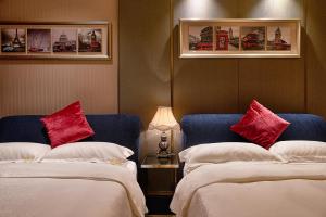 Heefun International Apartment - Zhujiang New Town FuLi Brand New World Plaza客房内的一张或多张床位