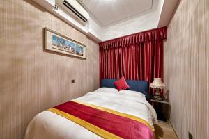 Heefun International Apartment - Zhujiang New Town FuLi Brand New World Plaza客房内的一张或多张床位