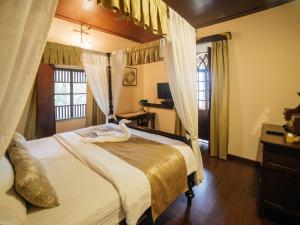 Postel nebo postele na pokoji v ubytování Casa Menezes - A Heritage Goan Homestay + 37 fotografií