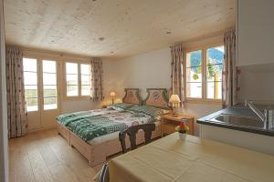 Postel nebo postele na pokoji v ubytování B&B Panorama