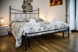 Postel nebo postele na pokoji v ubytování Albergo Diffuso Zoncolan