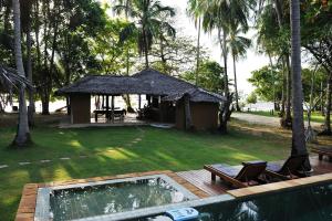 a resort with a gazebo and a swimming pool at KhaoTong Villa at Melina's in Tha Lane Bay