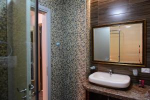 Een badkamer bij Villamaria Hotel