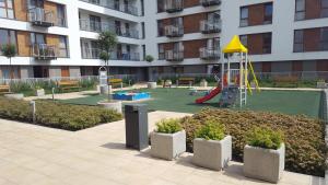 plac zabaw w budynku apartamentowym z: w obiekcie Łódź Fabryczna Apartament w Łodzi