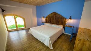 Posteľ alebo postele v izbe v ubytovaní Casa Rural Cal Rossa de Taus SPA