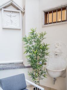 
a white toilet sitting next to a window in a bathroom at Luxury Apartment On Grand Canal in Venice
