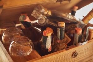 a wooden box filled with bottles of wine at Hotel Alle Ciaspole in Fondo +16 photos