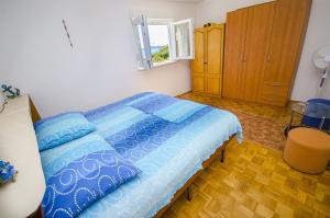 Krevet ili kreveti u jedinici u objektu Apartment Dina