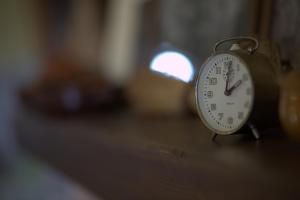 a clock sitting on top of a table at Fattoria Capobianco in Montefiascone