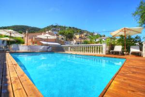 The swimming pool at or close to VILLA ES TORRENTÓ (HIGH FLYER)