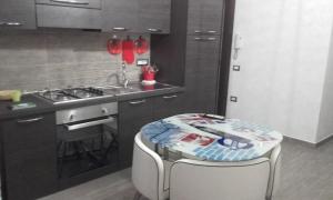 A kitchen or kitchenette at Rooms Loru