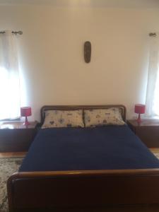 Giường trong phòng chung tại Casa Vacanze alle Vergini